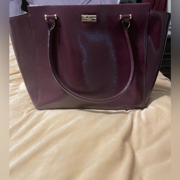 Kate Spade burgundy patent leather bag.  No signs of wear. - Picture 2 of 6